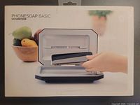 Front of box showing PhoneSoap Basic UV Sanitizer with image of device