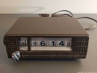 Front view showing flip display and speaker grille