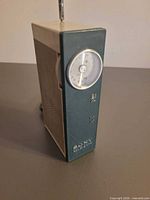 Front three-quarter view showing SONY badge, tuning dial, and general wear