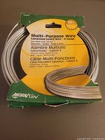 Front view of sealed spool showing brand, length, gauge, safe load