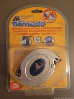 Front view of sealed packaging displaying the device and compatibility information