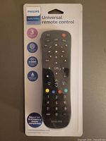 Front view of sealed Philips universal remote on blister card