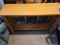 Full view of wooden console table front and top