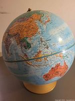 Full view of Replogle World Nation Series globe on base
