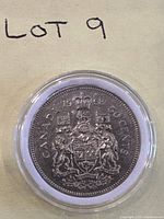 Full view of 1968 Canadian 50-cent coin in capsule