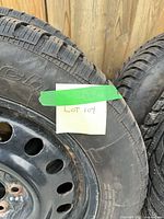 Tire sidewall showing model and rim condition