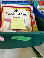 Front of bin showing My Wonderful Aunt book and sticky note identifying lot