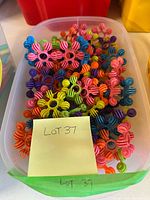 Top view of bin filled with colourful interlocking pieces