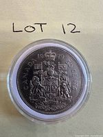 Reverse of 1979 Canadian 50-cent coin showing Coat of Arms