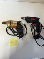 Both drills side by side with cords