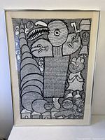 Full view of framed ink artwork showing overall composition and frame