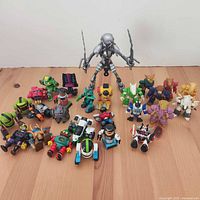 Full lot overview showing Predator in centre, Z-Bots on left, Battle Beasts on right
