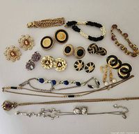 Full lot overview showing earrings, bracelets and necklaces