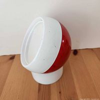 mirror ball on base showing angled view