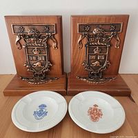 Front view of both bookends and both ashtrays