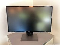 Front view of Dell monitor on stand