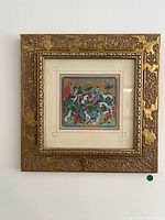 Full front view of framed print hung on wall