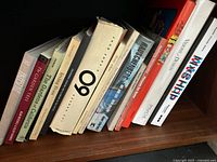 Shelf view showing titles and condition of several books