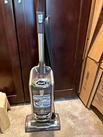 Full view of Shark upright vacuum with power cord wrapped