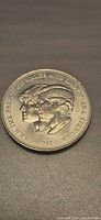 Obverse of 1981 Charles & Diana wedding crown coin showing conjoined portraits and year