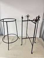 Both metal plant stands side by side