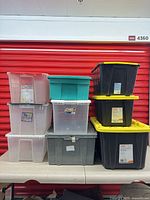 Group shot of all nine totes stacked on table
