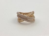 Angled view of crossover ring showing pavé and mesh bands