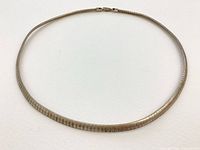 Full view of snake bracelet laid flat