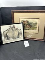 Both framed artworks side by side for scale and overview