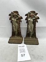 Front view of both Verona Eve bookends showing design and finish wear