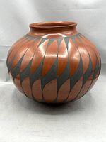 Front view of redware vessel showing geometric pattern