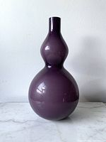 Full frontal view of aubergine double-gourd vase