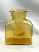 Front view of amber Blenko Model 384 water bottle