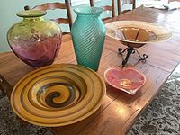 Group shot showing all five art glass pieces and stand