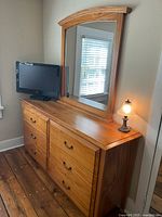 Front view of dresser with attached mirror