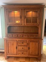 Front view of oak buffet and hutch closed