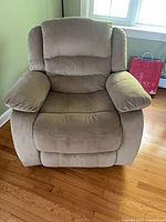 Front view of beige oversized recliner
