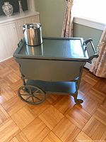 Cart front view with ice bucket on glass top