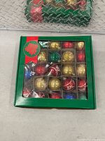 Closed box showing contents through plastic window