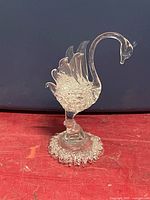 Clear glass swan figurine front view