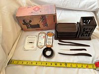 full set with box, trays, utensils, ring and ruler for scale