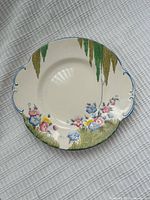 Front of plate showing floral design and rim detail