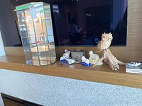 cabinet and assorted decor on shelf