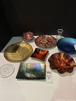 Group shot of all nine decorative glass items