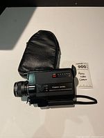 Canon 310 XL camera front left view with case
