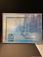 Full view of framed sailboat print