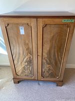 Front view of two-door wooden cabinet