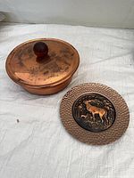 Copper dish with lid and wall plate displayed