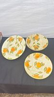 Three matching Himark Italian ceramic pieces: one platter, two bowls