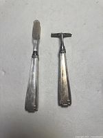 Toothbrush and razor front view